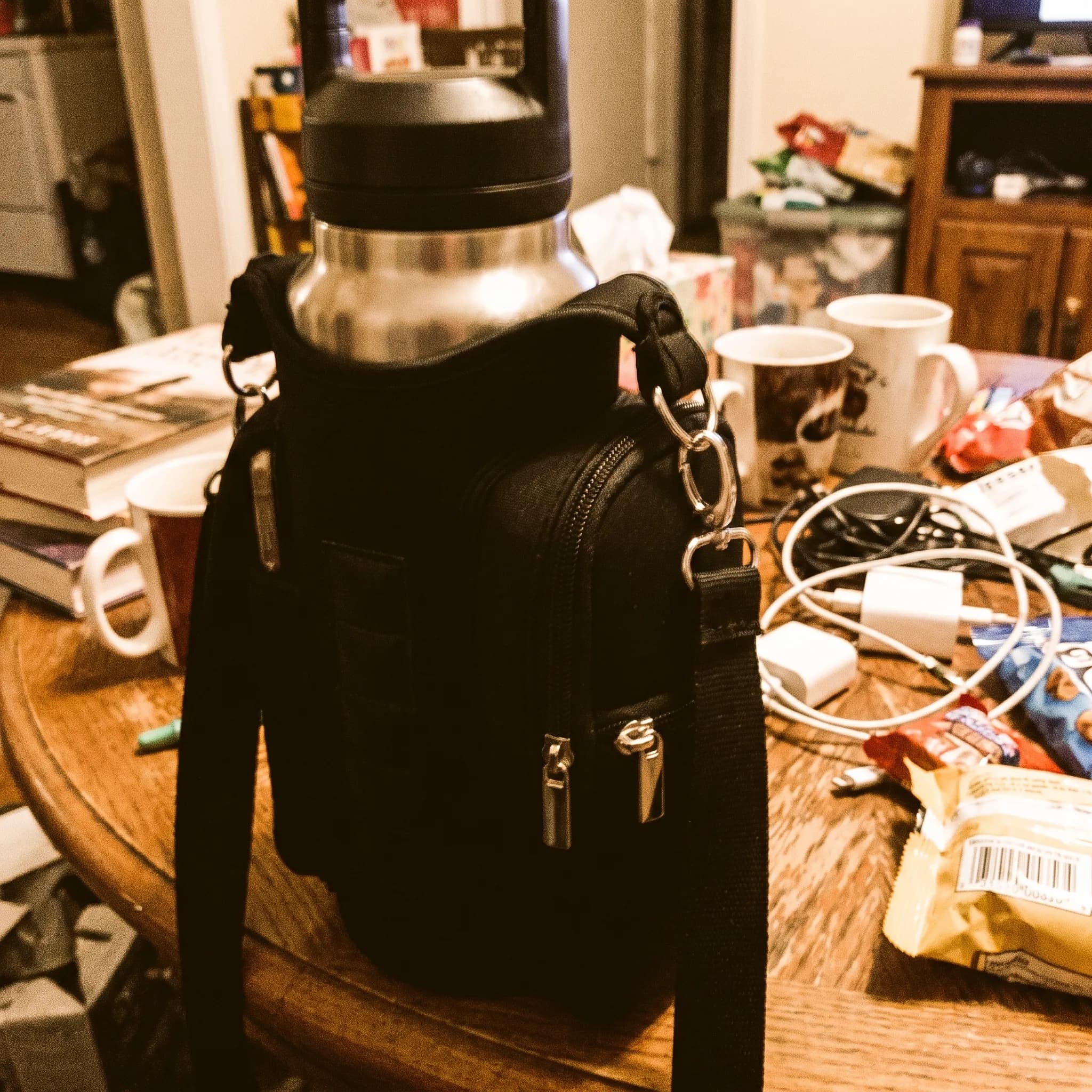 The same bag: blurred, in dim light, on a cluttered table